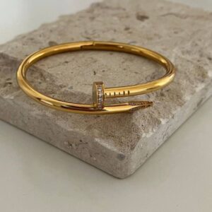 Gold nail bangle bracelet with pavé stones