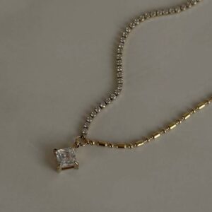 Two-tone solitaire necklace with princess-cut pendant